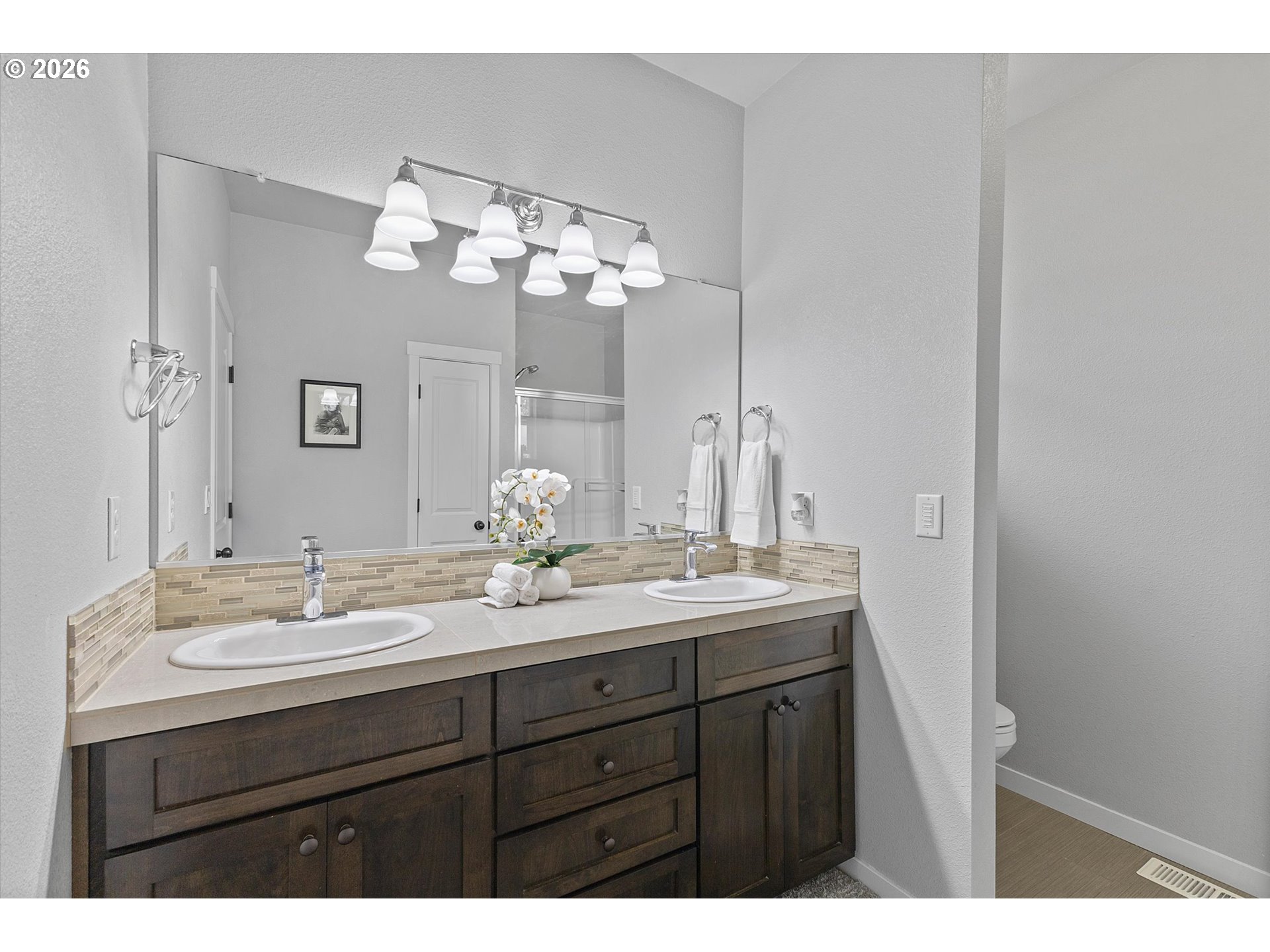 830 Southeast Darrow Road Estacada, OR 97023 - Photo 27 of 45 a bathroom with a granite countertop sink and a mirror