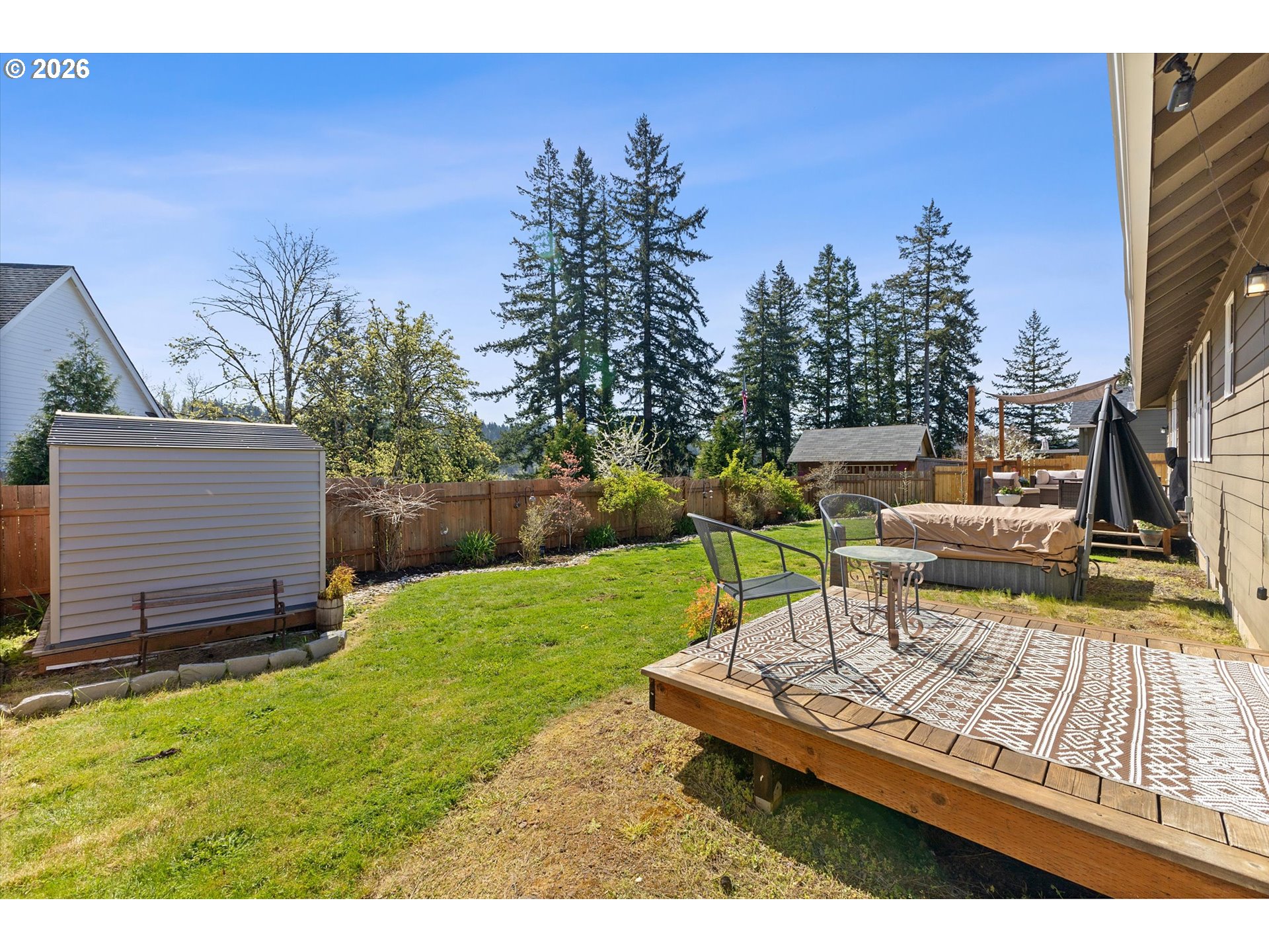 830 Southeast Darrow Road Estacada, OR 97023 - Photo 37 of 45 a view of a backyard with sitting area
