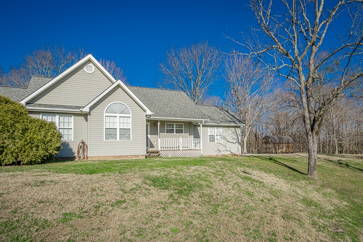 391 Oakley Allons Road Allons, TN 38541 - Photo 2 of 35 a front view of a house with a yard