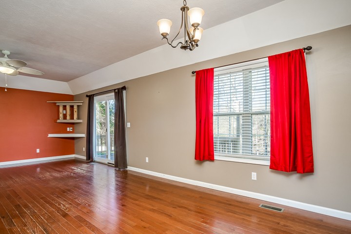 391 Oakley Allons Road Allons, TN 38541 - Photo 5 of 35 a view of empty room with wooden floor and fan