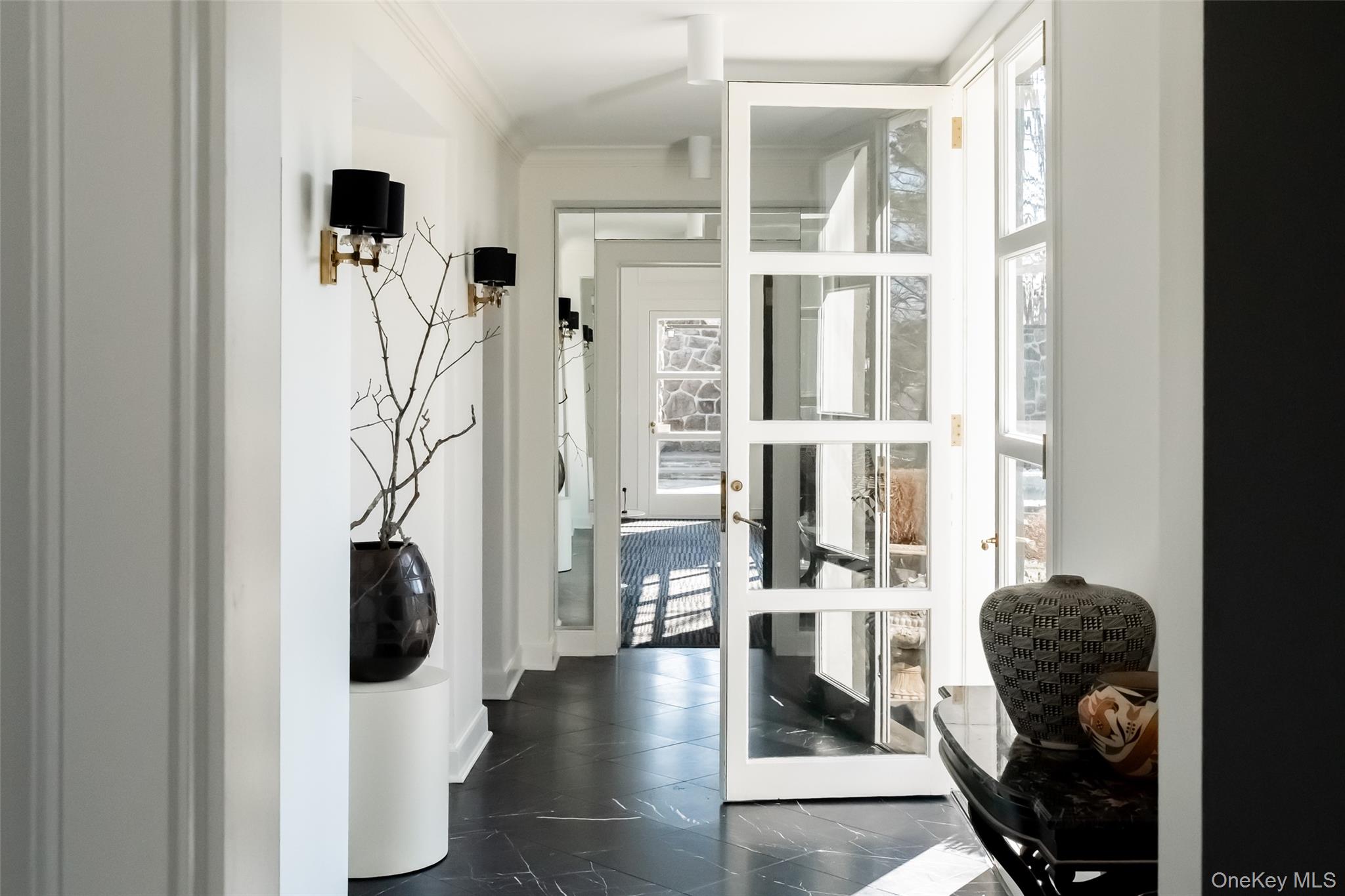 72 Lookout Road Tuxedo Park, NY 10987 - Photo 24 of 49 a view of a living room with furniture and floor to ceiling window