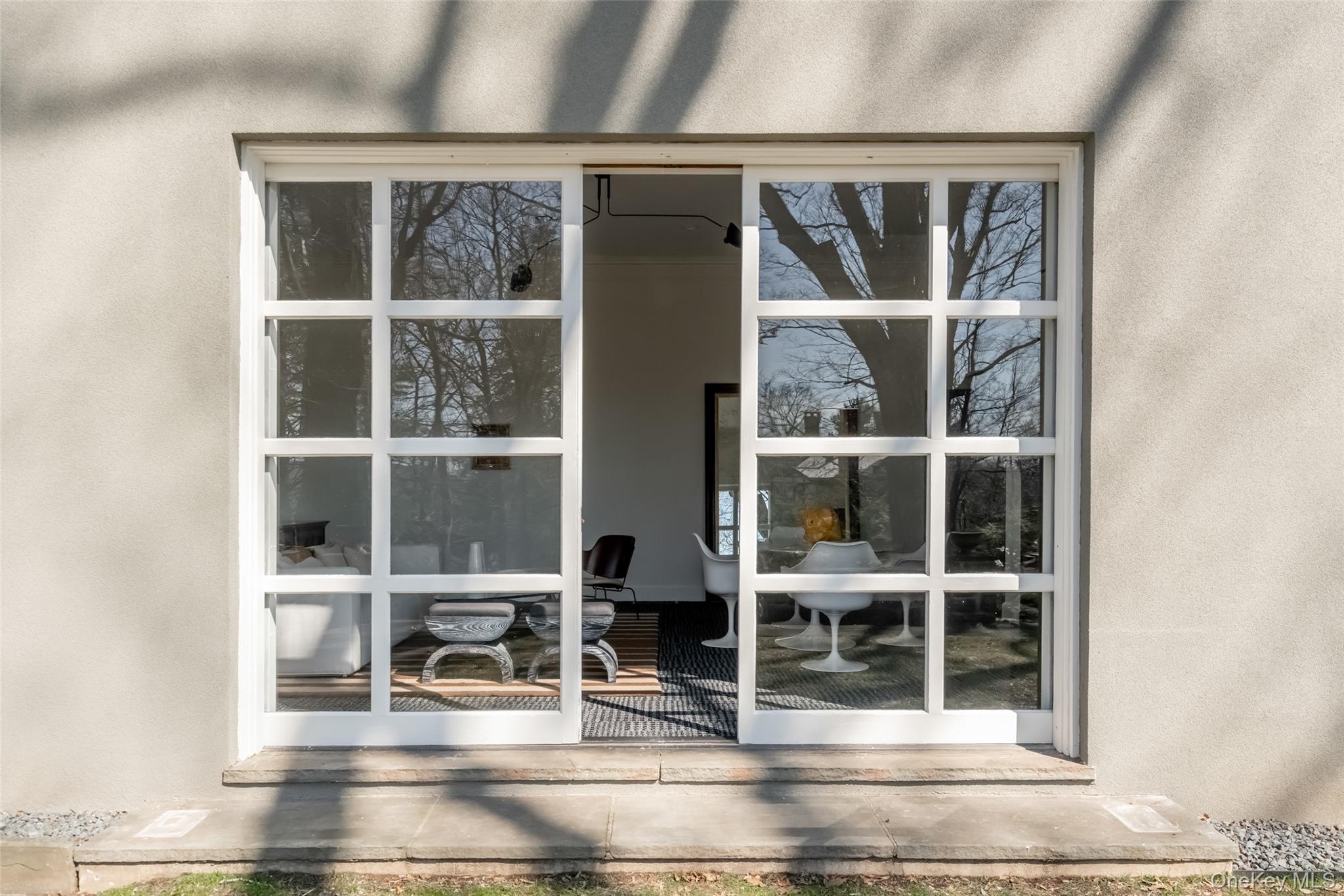 72 Lookout Road Tuxedo Park, NY 10987 - Photo 35 of 49 a black and white room with wooden floor