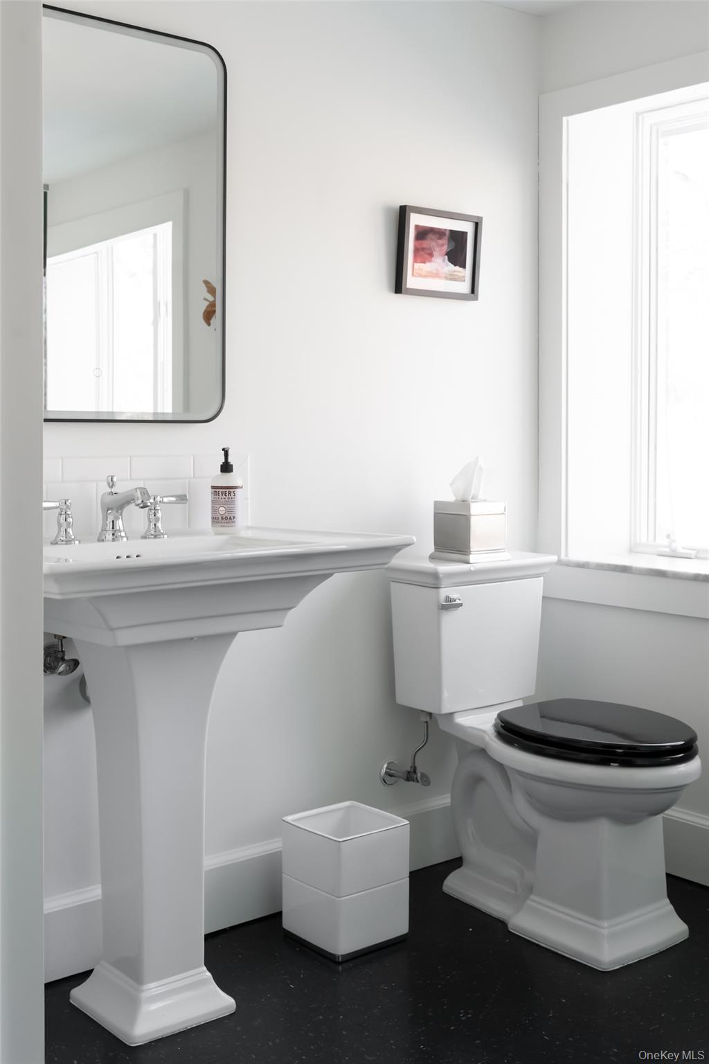 72 Lookout Road Tuxedo Park, NY 10987 - Photo 44 of 49 a bathroom with a sink toilet and a mirror