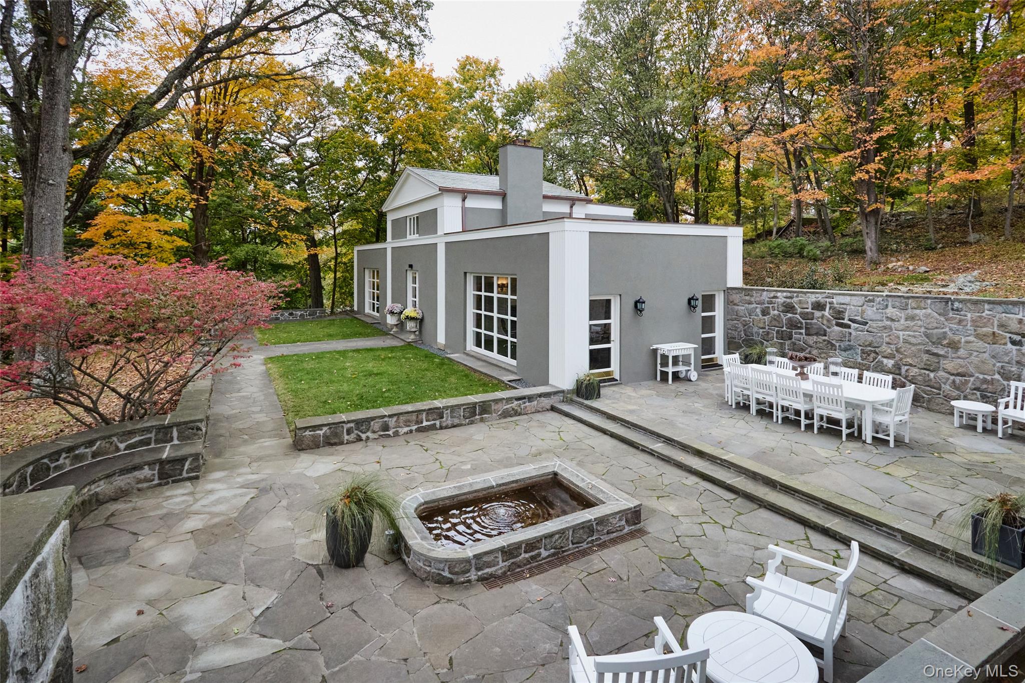 72 Lookout Road Tuxedo Park, NY 10987 - Photo 7 of 49 a view of a white house with a yard