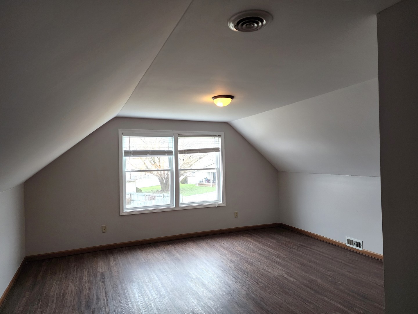 240 Mitchell Court Braidwood, IL 60408 - Photo 13 of 18 an empty room with wooden floor and windows