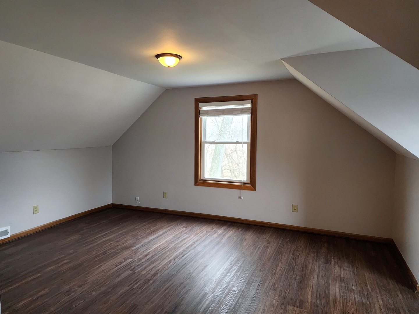 240 Mitchell Court Braidwood, IL 60408 - Photo 15 of 18 an empty room with wooden floor and windows