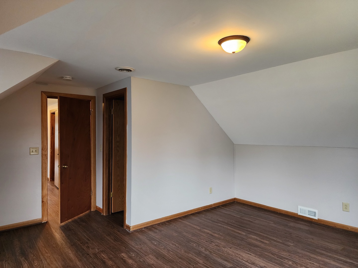 240 Mitchell Court Braidwood, IL 60408 - Photo 16 of 18 a view of an empty room with wooden floor