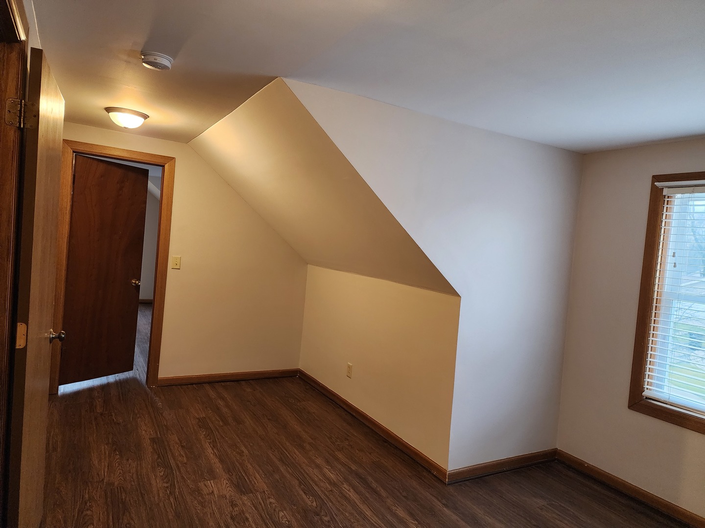 240 Mitchell Court Braidwood, IL 60408 - Photo 18 of 18 wooden floor in an empty room with a window