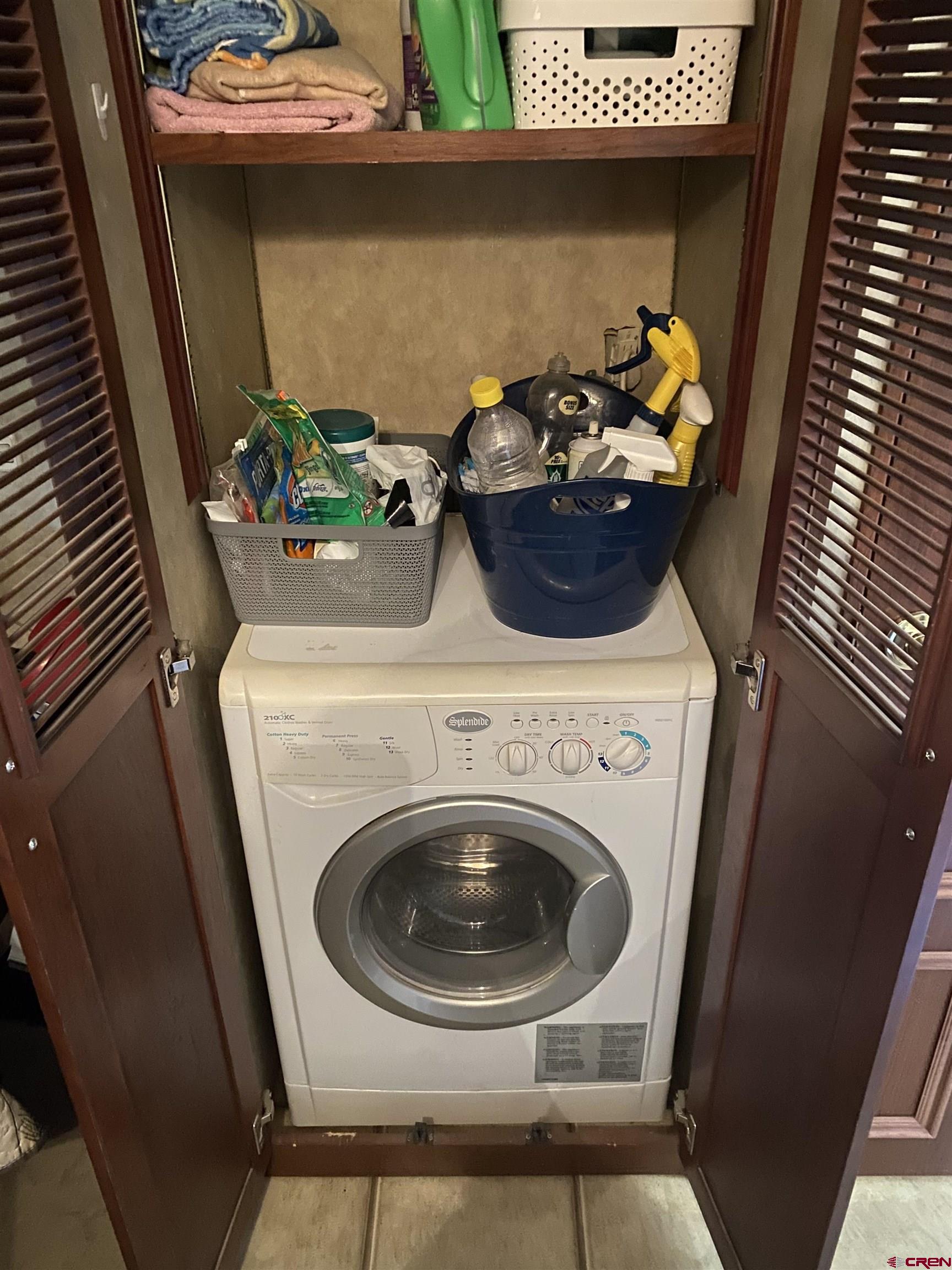 2444 Crooked Road Pagosa Springs, CO 81147 - Photo 13 of 22 a utility room with dryer and washer