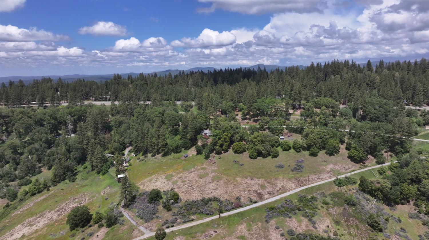4850 8 Mile Road Camino, CA 95709 - Photo 19 of 30 a view of a lake with a mountain in the background
