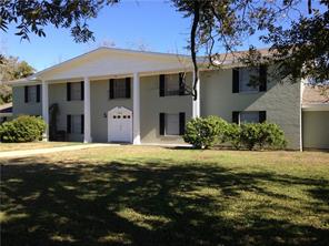 1400 Fairground Street, Unit C Taylor, TX 76574 - Photo 1 of 12 a front view of a house with a garden