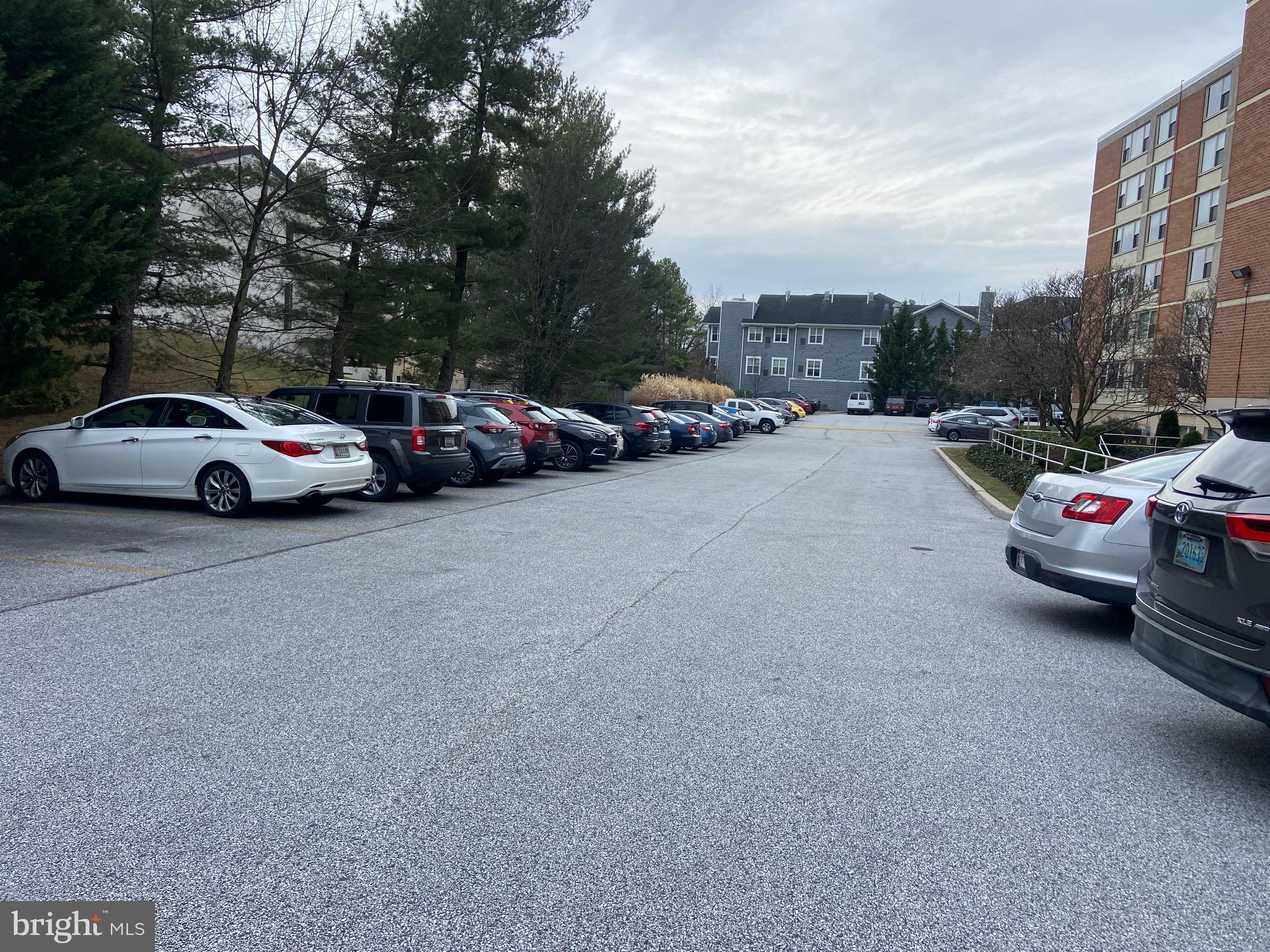 4401 Roland Avenue, Unit 115 Baltimore, MD 21210 - Photo 25 of 25 a view of street with parked cars