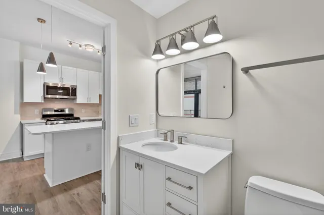 a view of a kitchen with washer and dryer