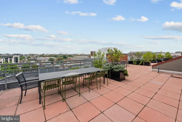a view of a terrace with furniture