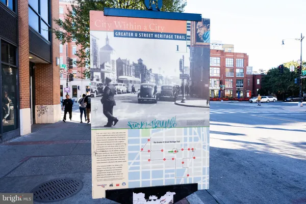 a view of a cafe with an outdoor seating