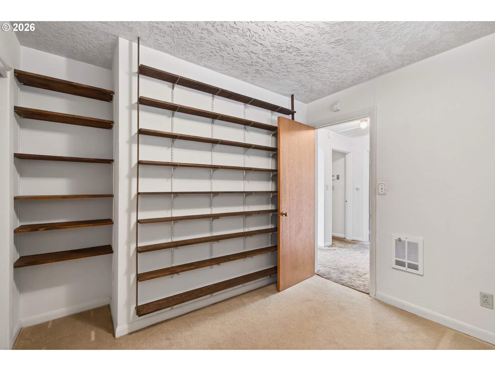 2 Pacific Place Longview, WA 98632 - Photo 13 of 32 a view of a room with shelf on the wall
