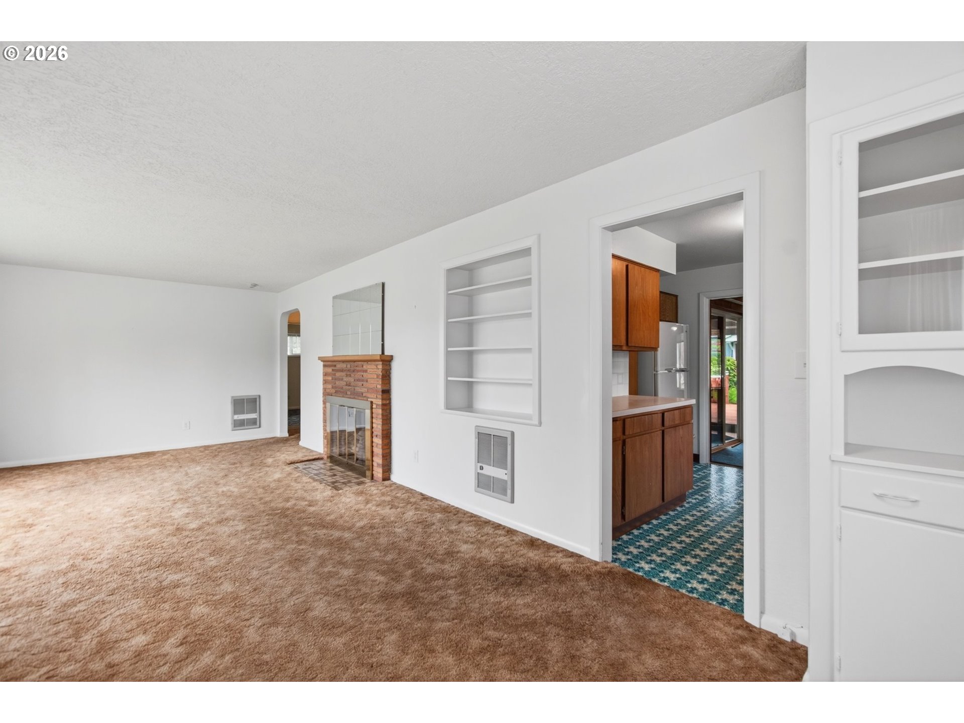 2 Pacific Place Longview, WA 98632 - Photo 6 of 32 a view of kitchen and hallway with wooden floor