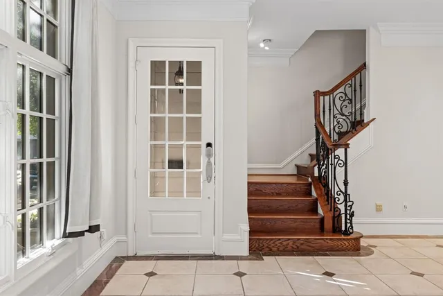 a view of front door with stairs