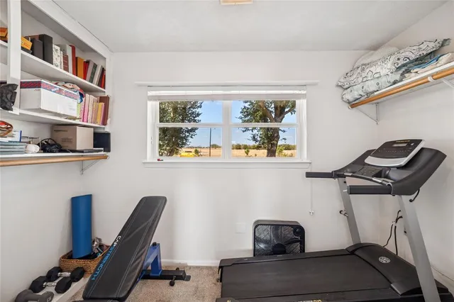 a view of workspace with wooden floor
