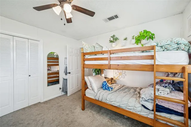 a bathroom with a sink mirror toilet and bathtub