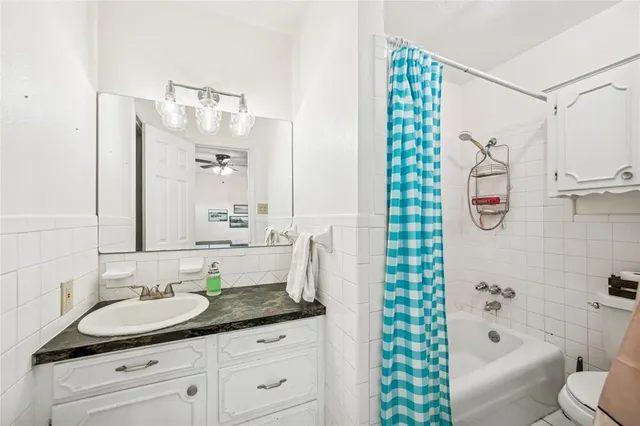 a view of a lake with a patio and wooden floor