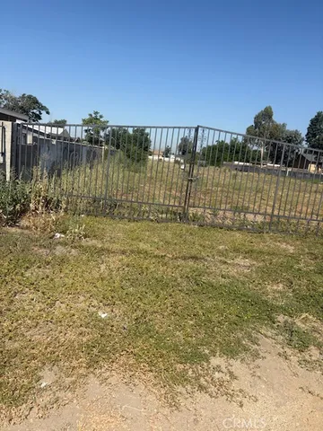 a view of a lake with houses in background