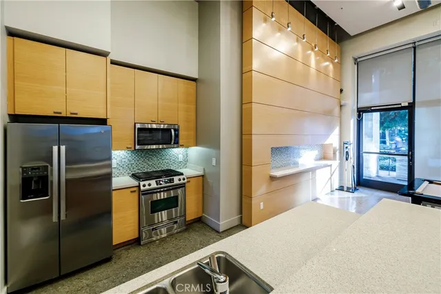 a view of balcony with furniture and garden