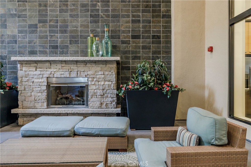 133 The Promenade North, Unit 426 Long Beach, CA 90802 - Photo 47 of 57 a living room with furniture and a fireplace