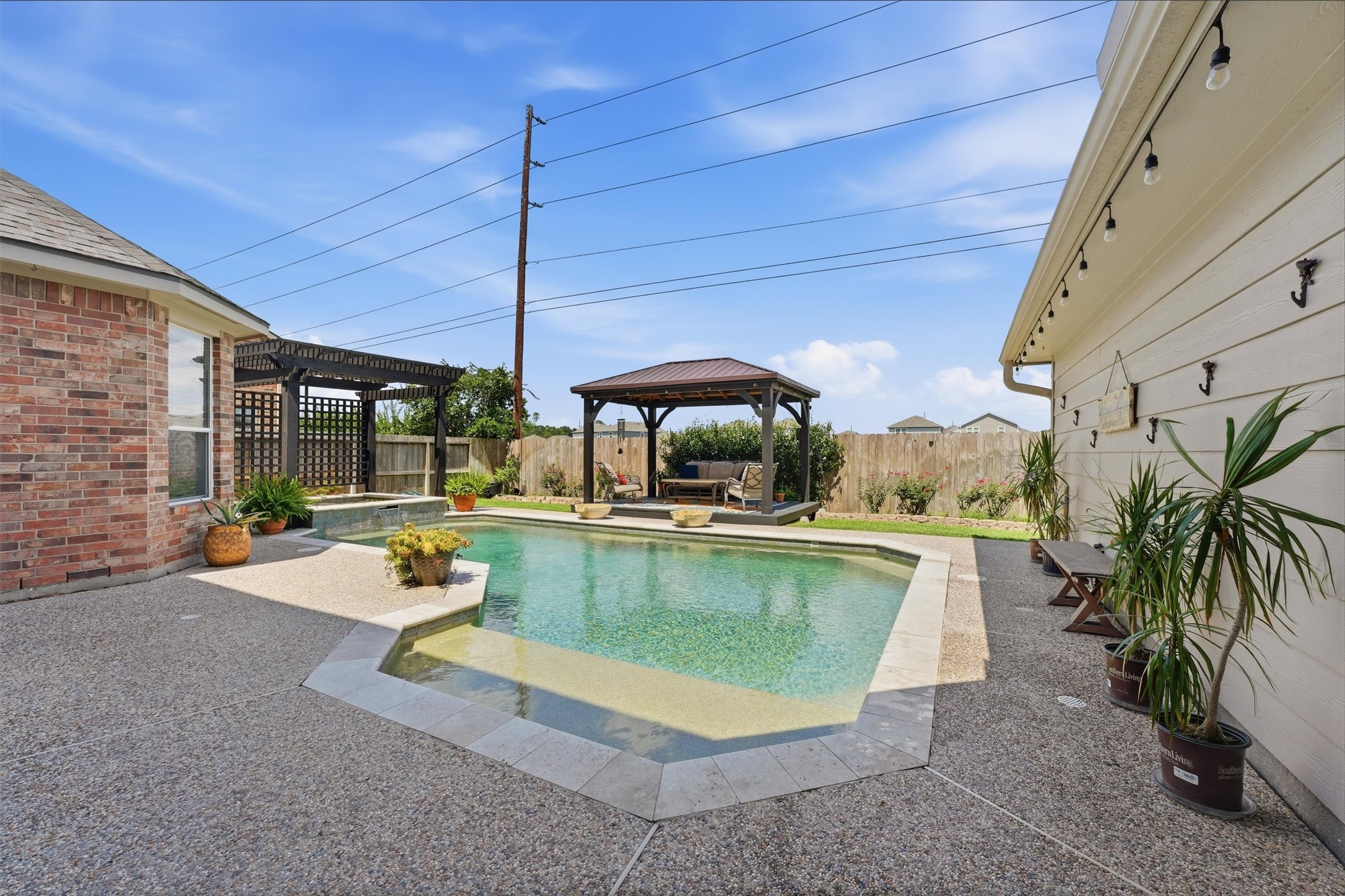 25181 Ramrock Drive Porter, TX 77365 - Photo 23 of 35 a view of a swimming pool with a patio
