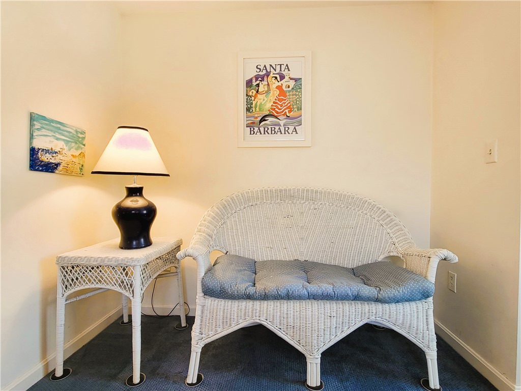 152 Tuckerman Avenue, Unit 14 Middletown, RI 02842 - Photo 9 of 15 Small sitting area in primary bedroom