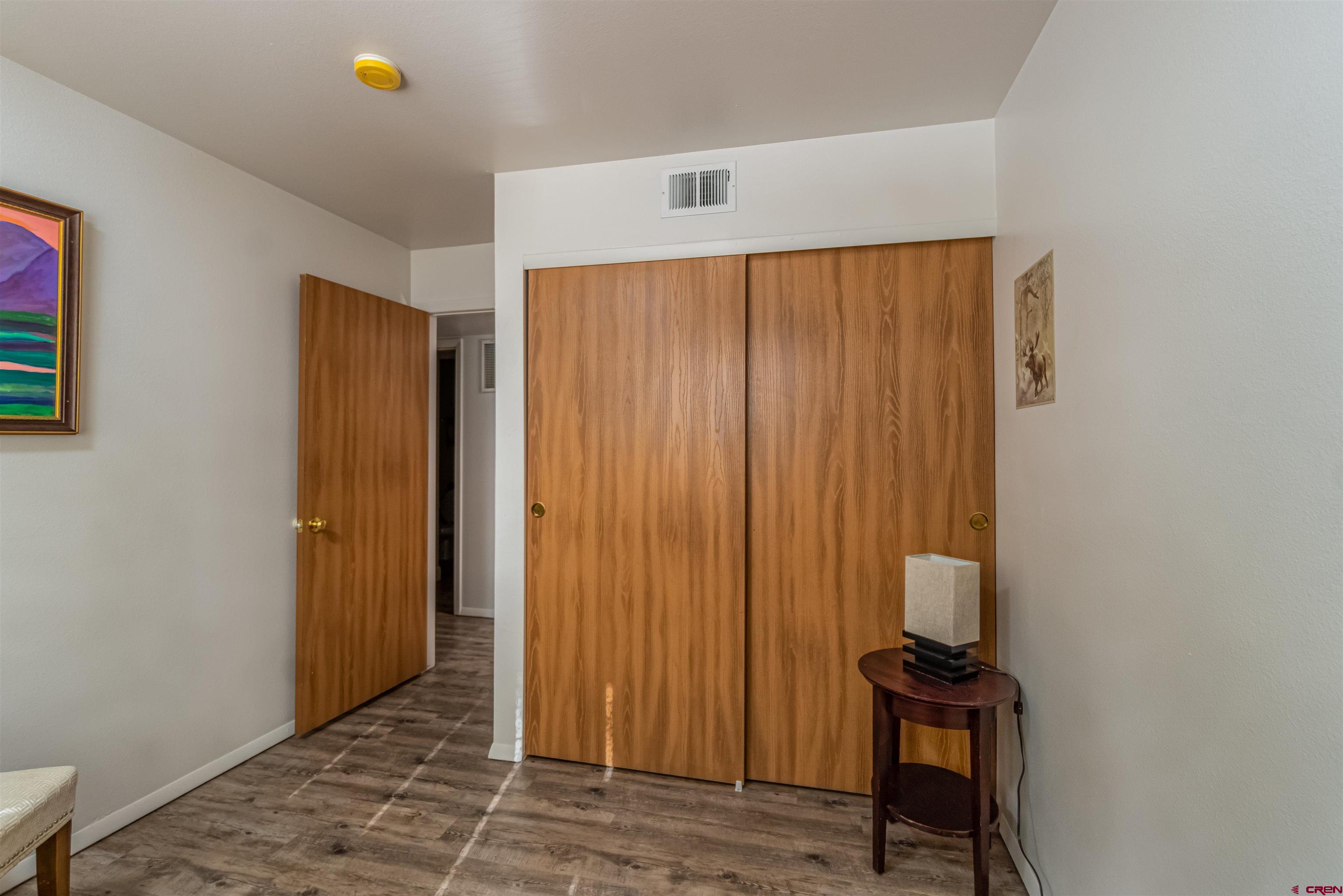 60 Westwood Place Durango, CO 81301 - Photo 8 of 16 a view of a hallway with wooden floor