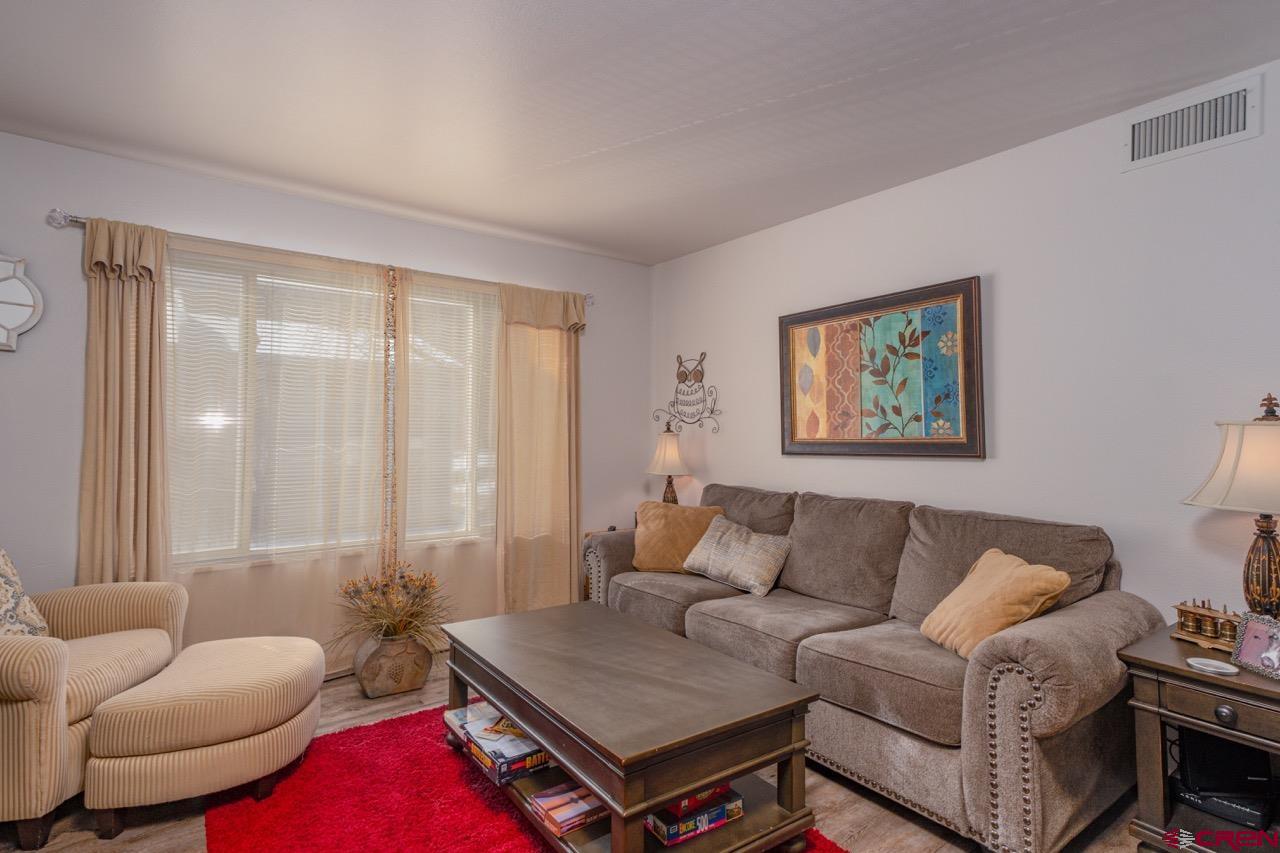 60 Westwood Place Durango, CO 81301 - Photo 9 of 16 a living room with furniture and a window