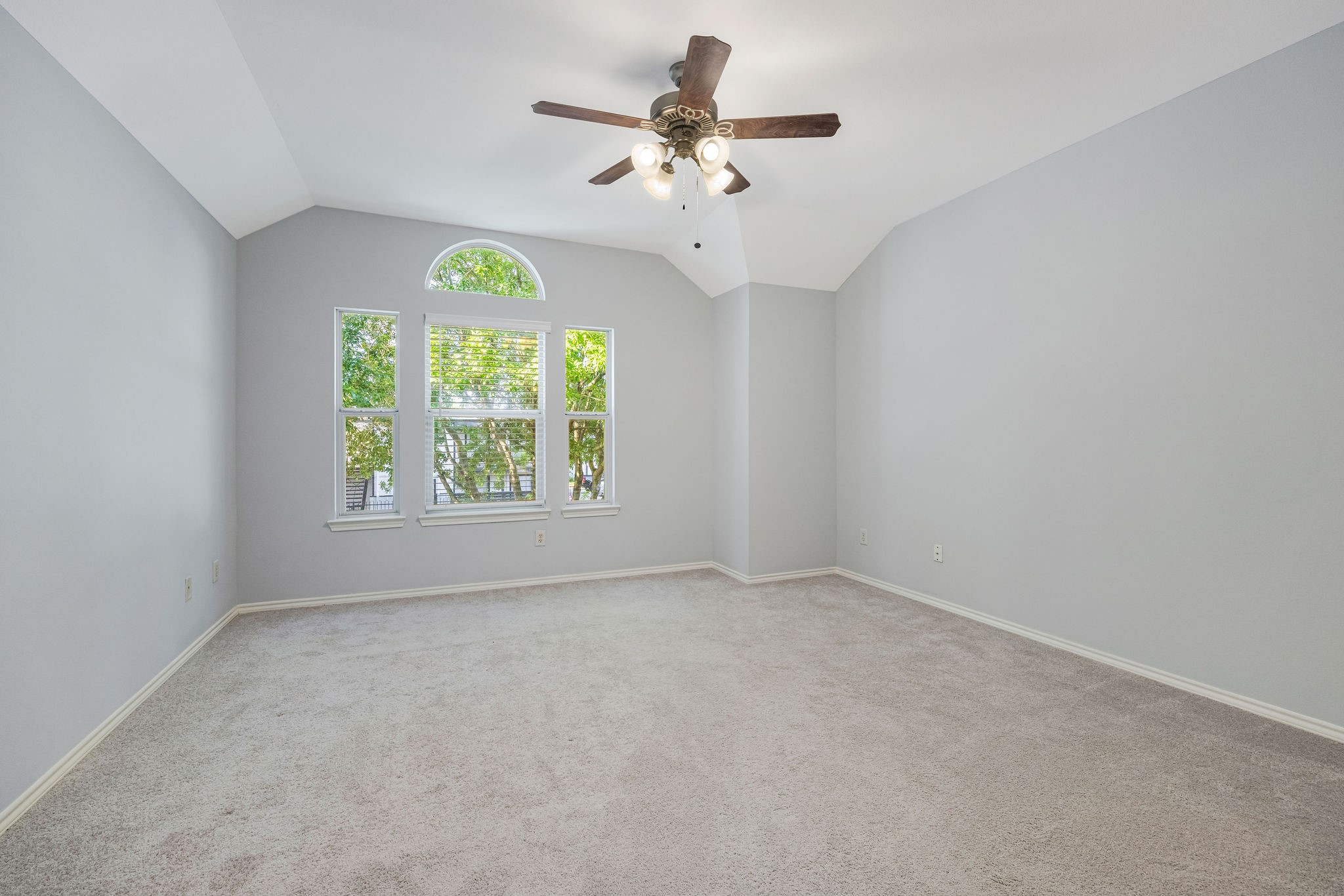 8018 Grow Lane Houston, TX 77040 - Photo 11 of 20 Primary bedroom with tree lined views.