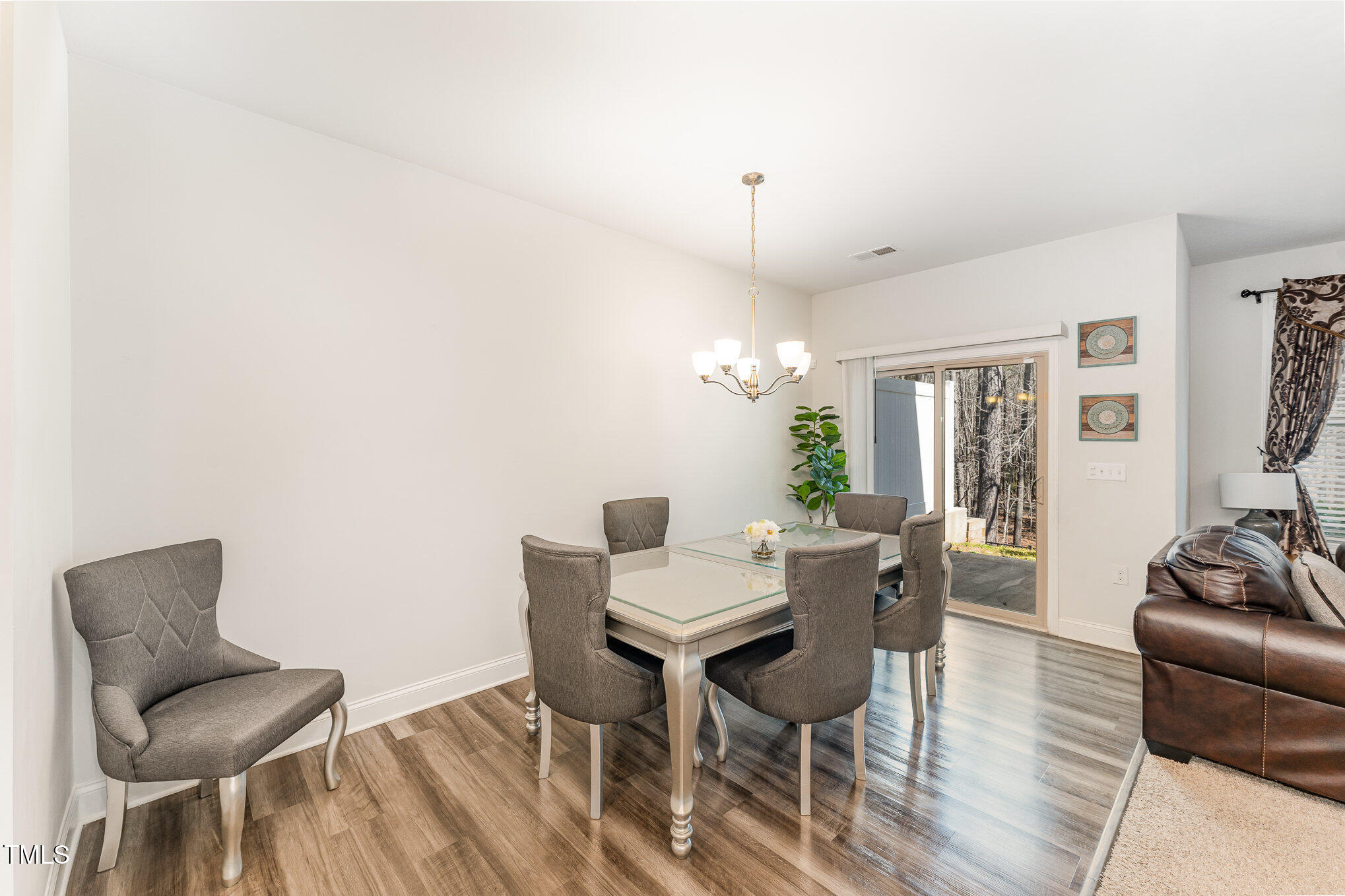 1101 Longitude Drive Durham, NC 27713 - Photo 11 of 26 a view of a livingroom with furniture and wooden floor