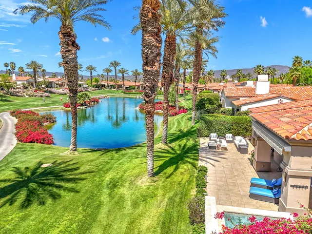 a view of a lake with a sitting area
