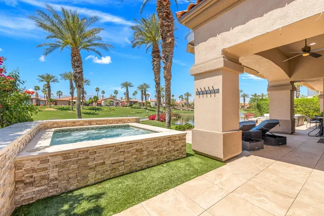a view of a playground with a patio