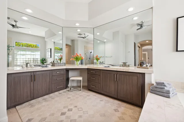 a spacious bathroom with a bathtub and a shower