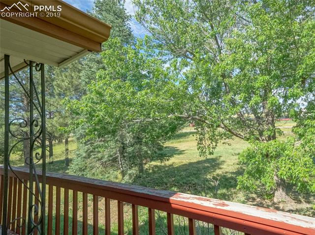 5805 Meridian Road Peyton, CO 80831 - Photo 13 of 22 View off of the deck toward the west.