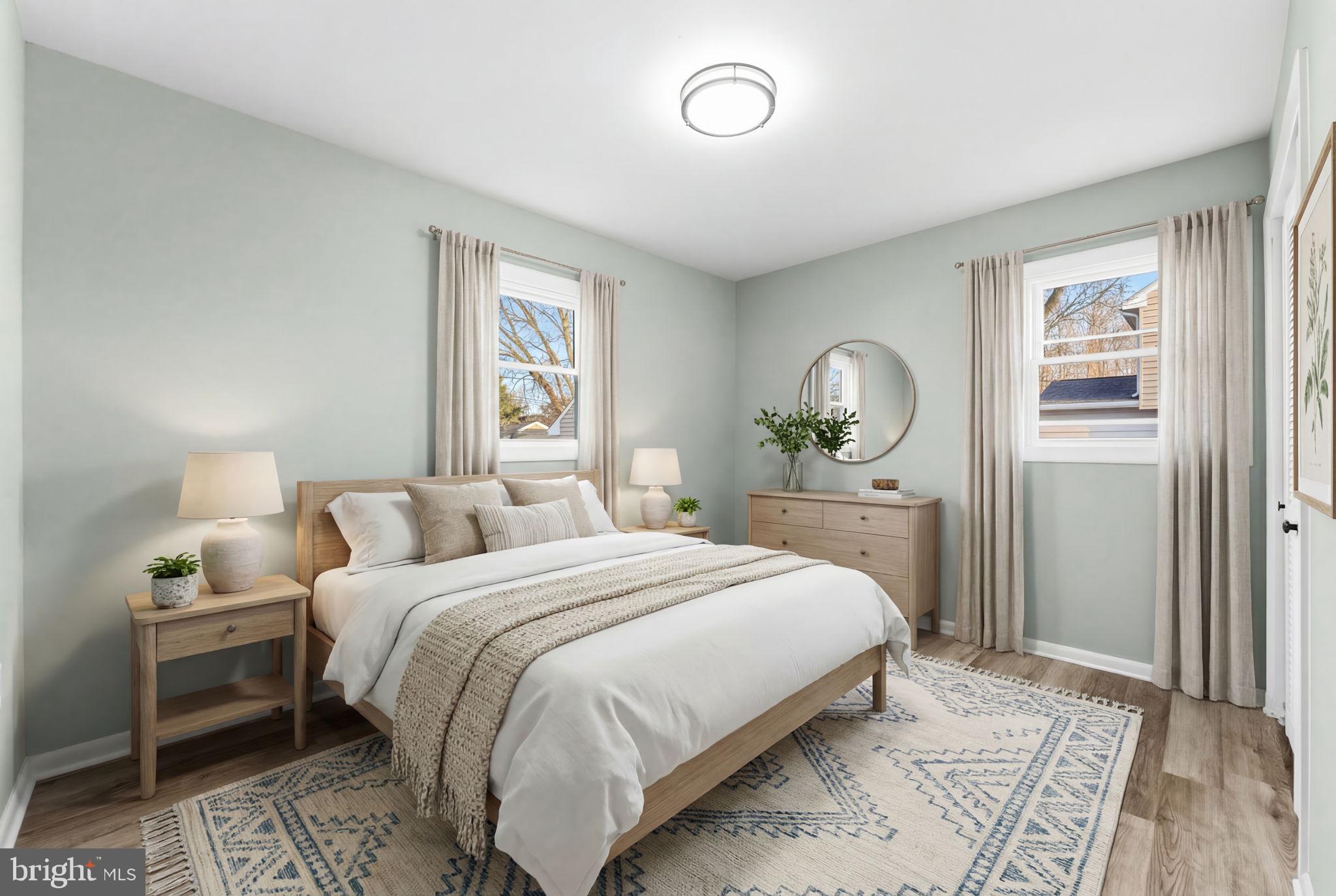 819 Old Harmony Road Newark, DE 19711 - Photo 17 of 39 a bedroom with a bed and a window