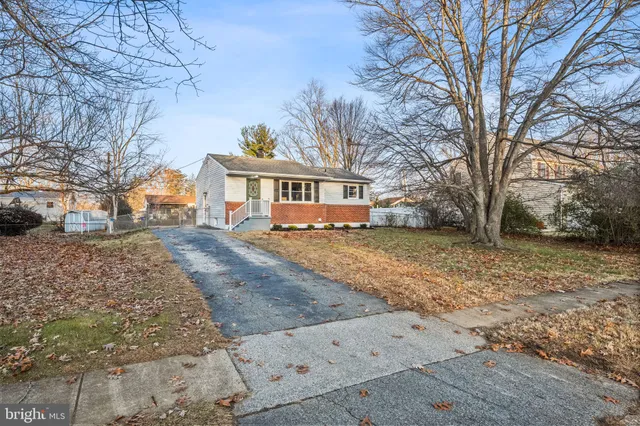 a view of a backyard of the house