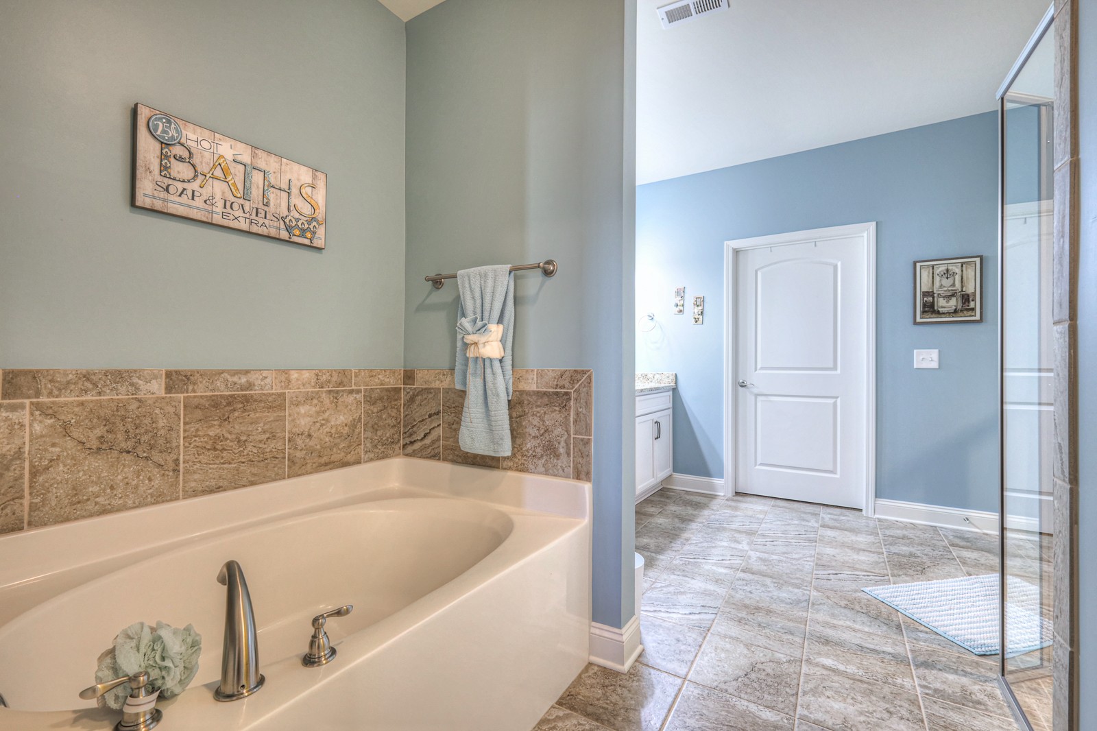 2252 Stonecenter Lane Murfreesboro, TN 37128 - Photo 19 of 36 a bathroom with a tub and shower