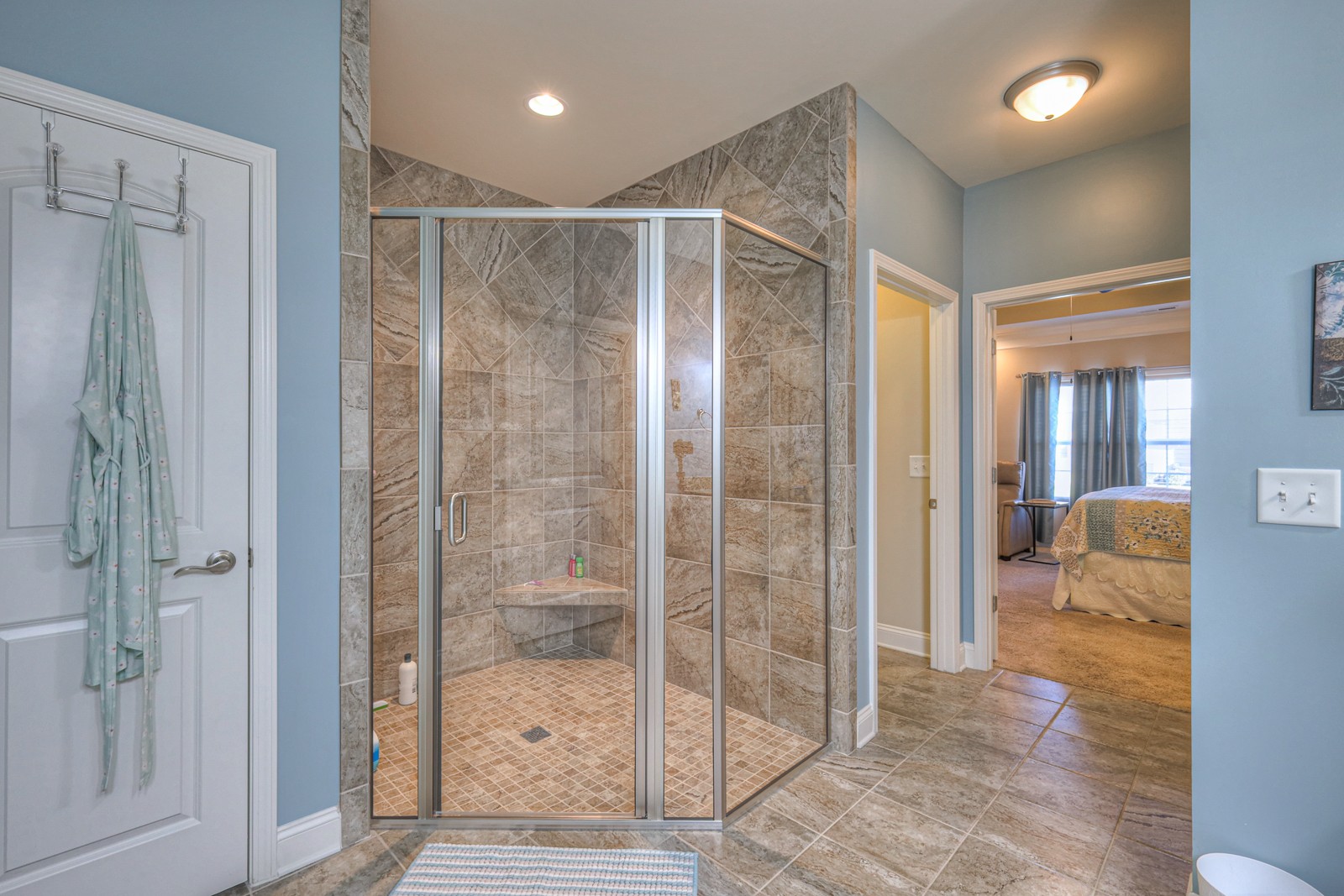 2252 Stonecenter Lane Murfreesboro, TN 37128 - Photo 21 of 36 a bathroom with a glass shower door