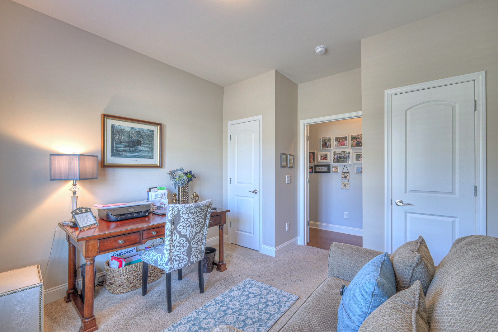 2252 Stonecenter Lane Murfreesboro, TN 37128 - Photo 25 of 36 a living room with furniture and a lamp
