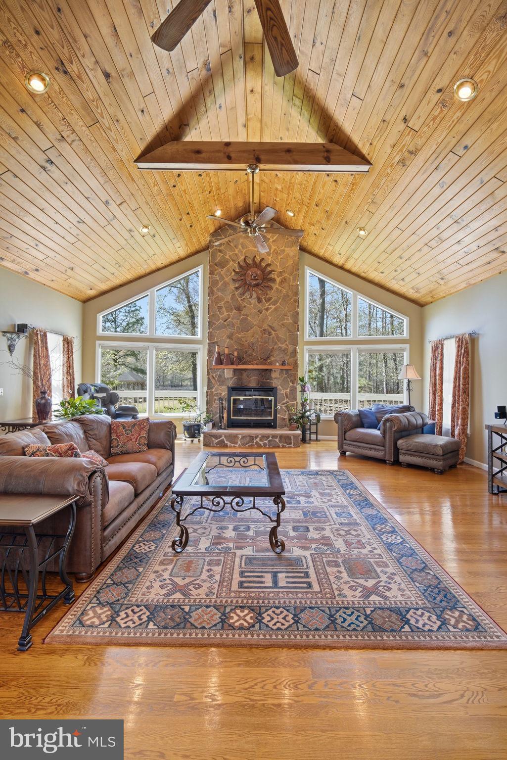 930 Spaniard Neck Road Centreville, MD 21617 - Photo 24 of 91 Spacious living room with rustic charm.