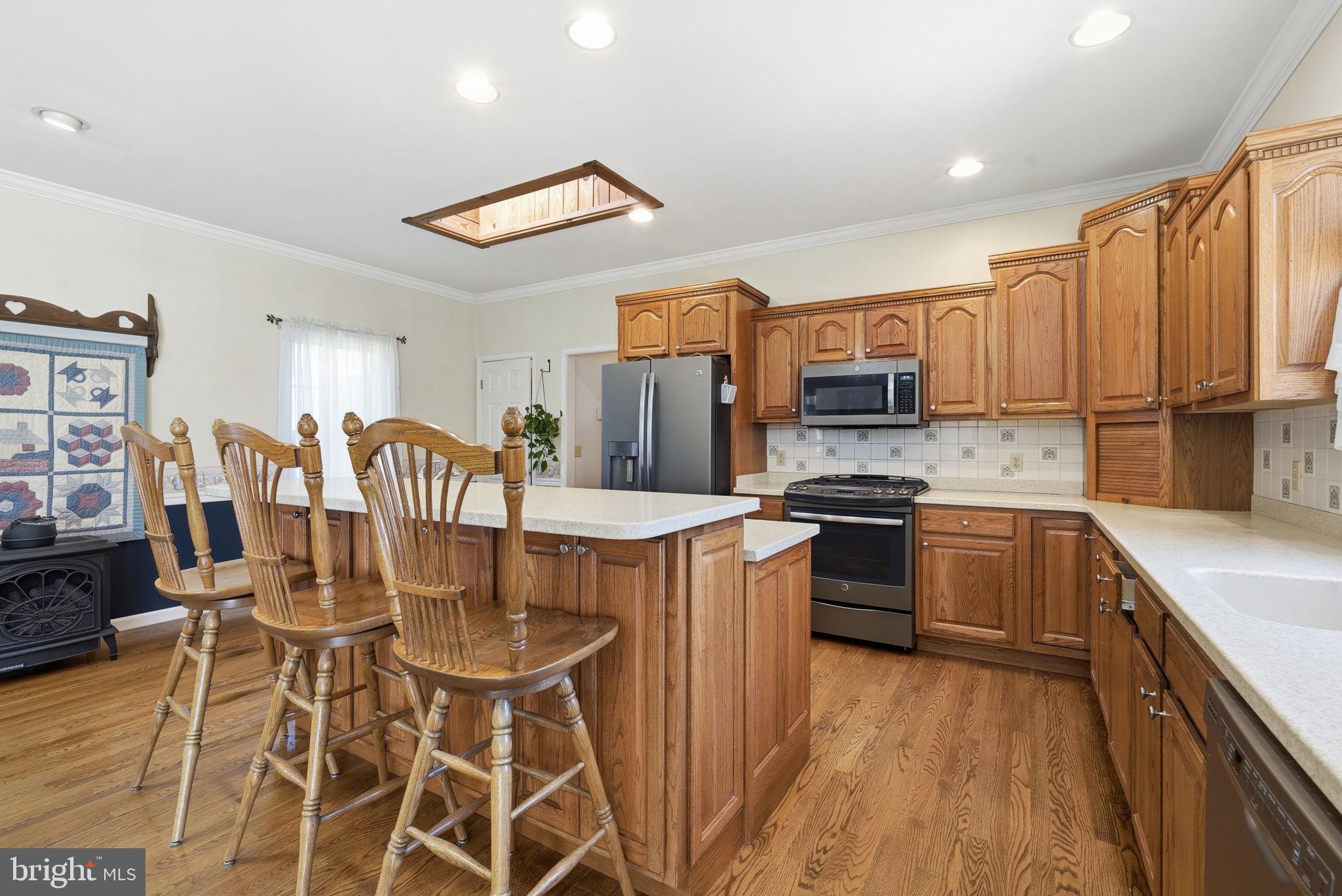 930 Spaniard Neck Road Centreville, MD 21617 - Photo 29 of 91 Warm, inviting kitchen with wood accents.