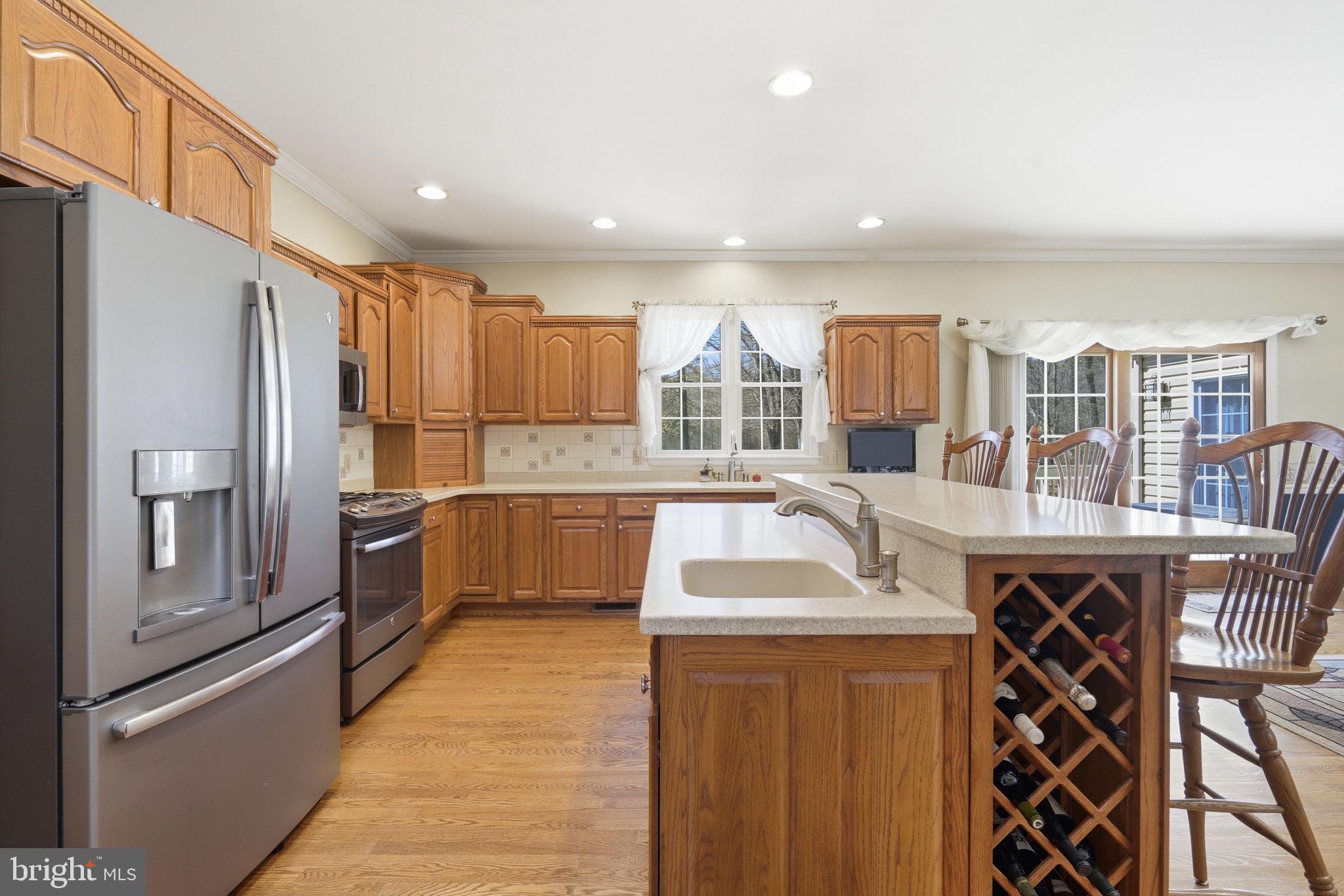 930 Spaniard Neck Road Centreville, MD 21617 - Photo 30 of 91 Inviting kitchen with warm wood tones.