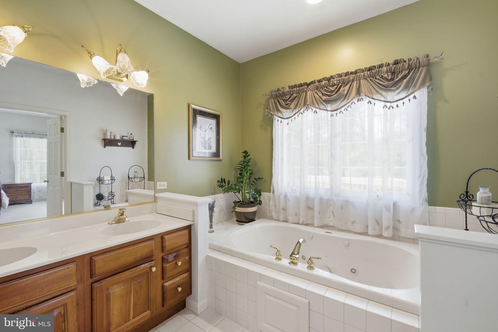 930 Spaniard Neck Road Centreville, MD 21617 - Photo 36 of 91 Serene spa-like bathroom retreat.