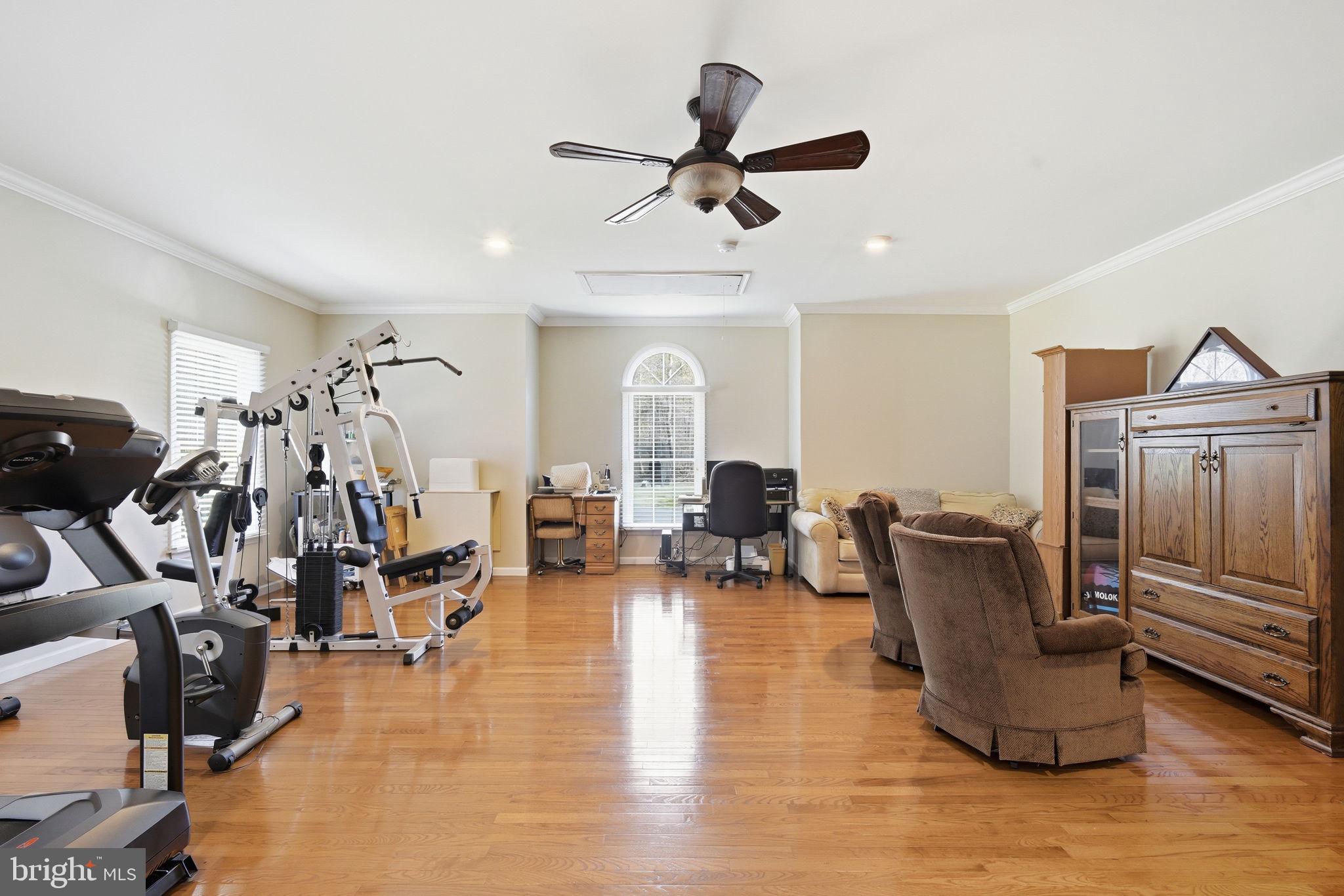 930 Spaniard Neck Road Centreville, MD 21617 - Photo 41 of 91 Spacious home gym with natural light.