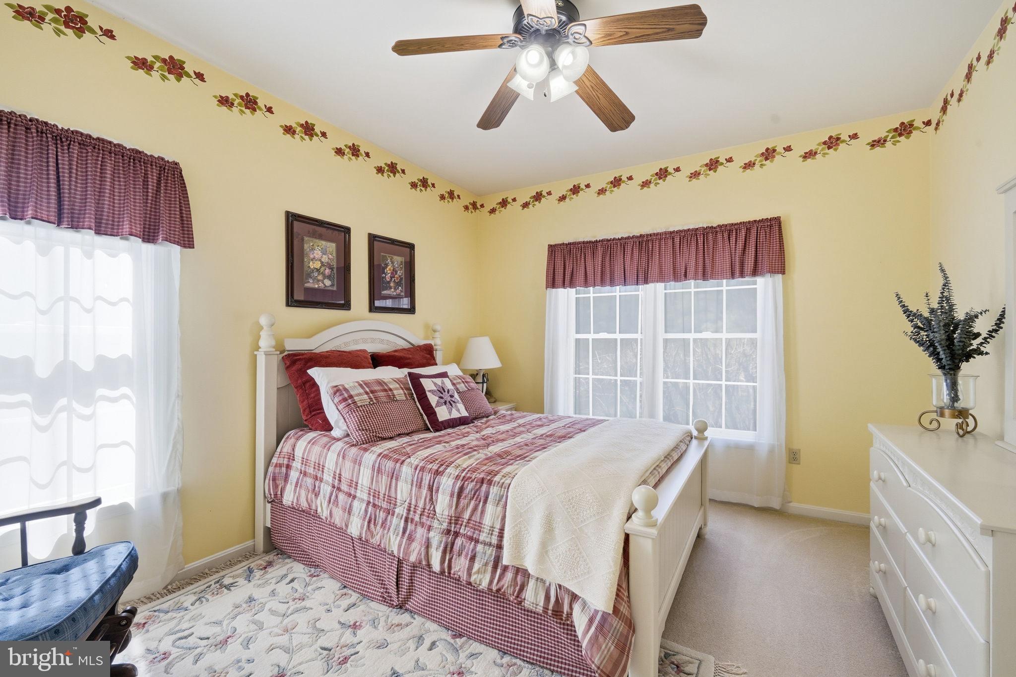 930 Spaniard Neck Road Centreville, MD 21617 - Photo 44 of 91 Charming yellow bedroom retreat.