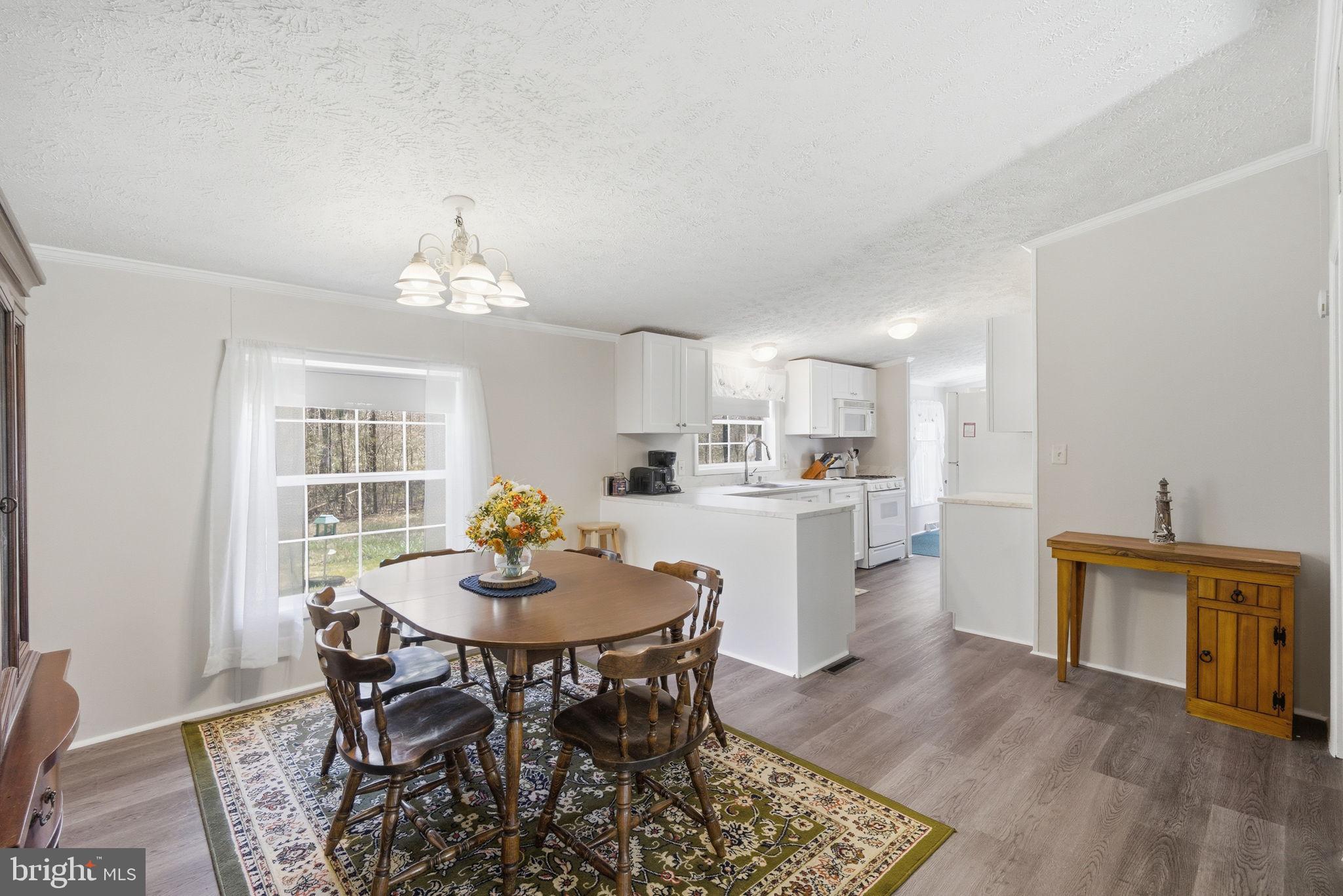 930 Spaniard Neck Road Centreville, MD 21617 - Photo 55 of 91 Bright and inviting dining space.